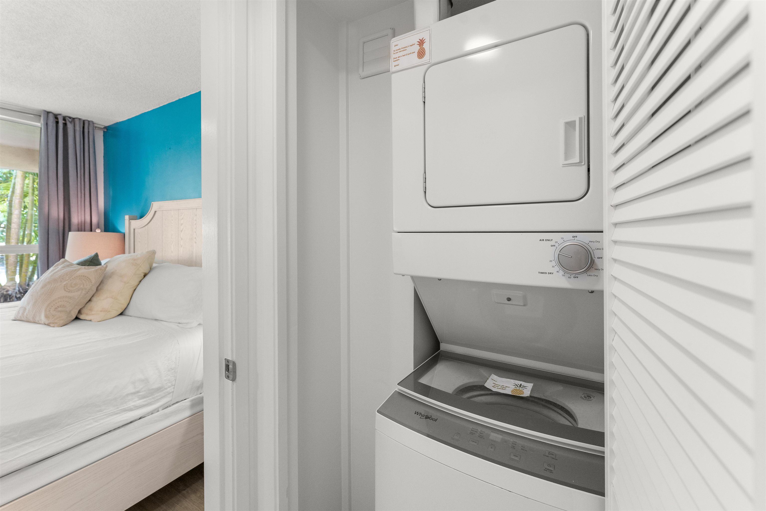 2575 South Kihei Road, Unit T110 Kihei, HI 96753 - Photo 22 of 24 a bedroom with a bed and a window