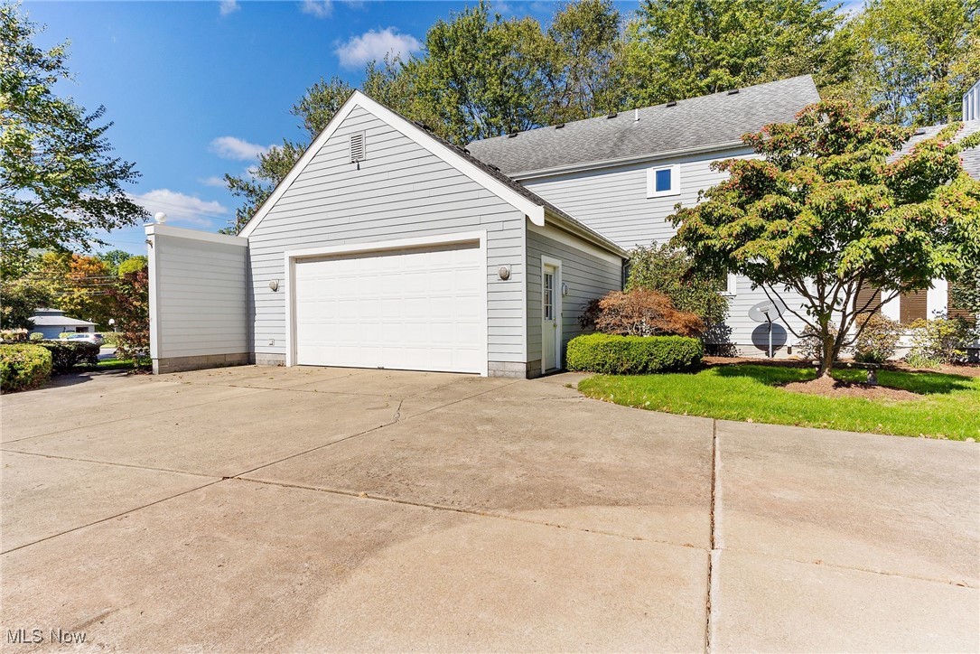 2430 Howland Wilson Road Northeast Warren, OH 44484 - Photo 5 of 33 View of home's exterior with a garage