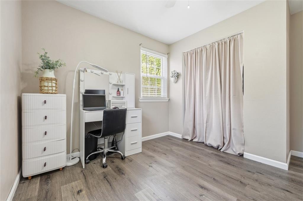 129 Meadowbrook Road Renfrew, PA 16053 - Photo 17 of 45 a view of a workspace with furniture and a window