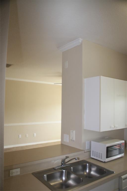 3621 Conroy Road, Unit 739 Orlando, FL 32839 - Photo 10 of 20 a bathroom with a sink and a bathtub