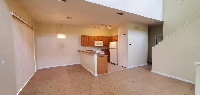 a view of a kitchen with a sink