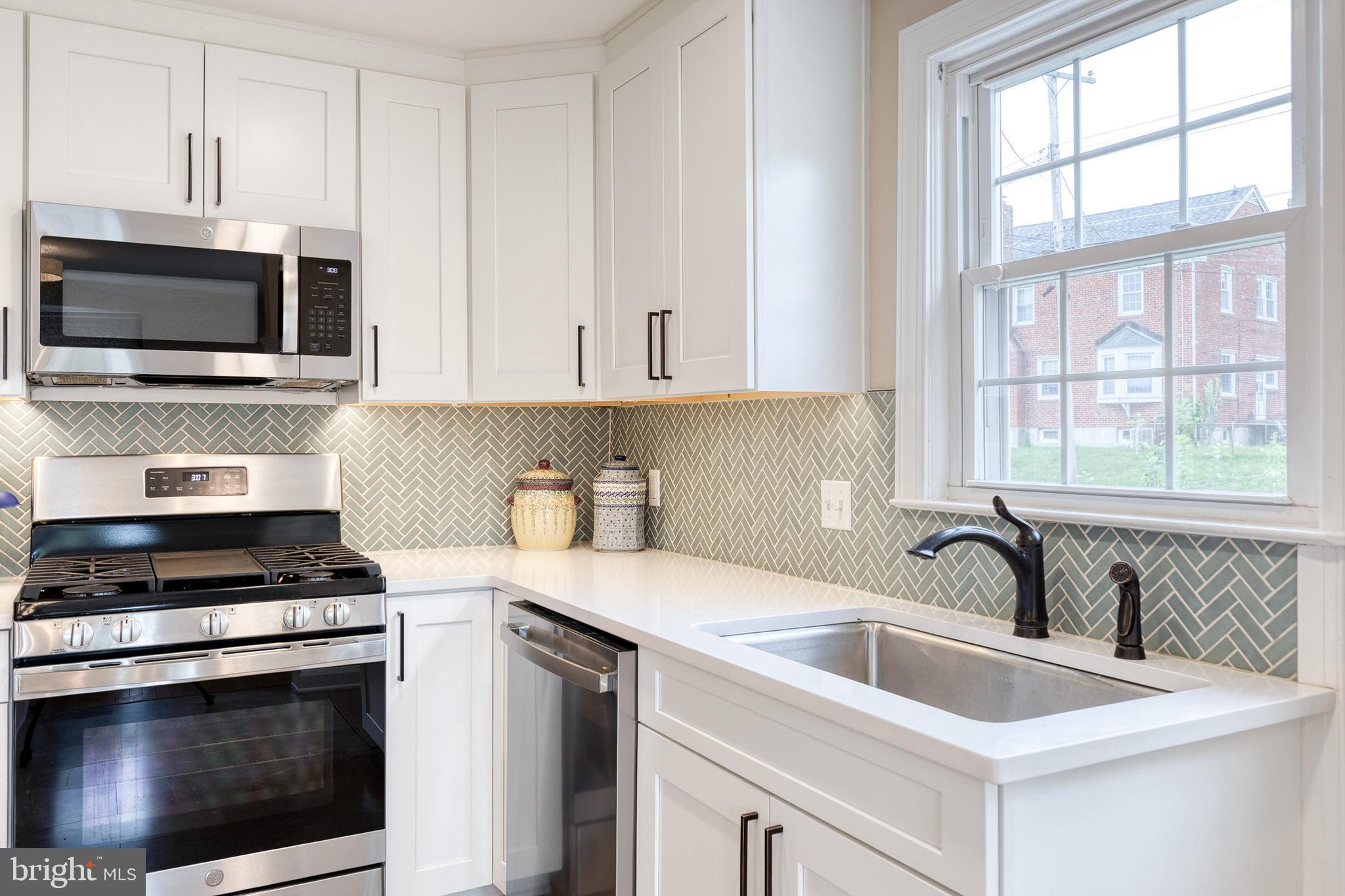 8222 Pleasant Plains Road Baltimore, MD 21286 - Photo 11 of 34 Kitchen- Newly updated with beautiful backspace