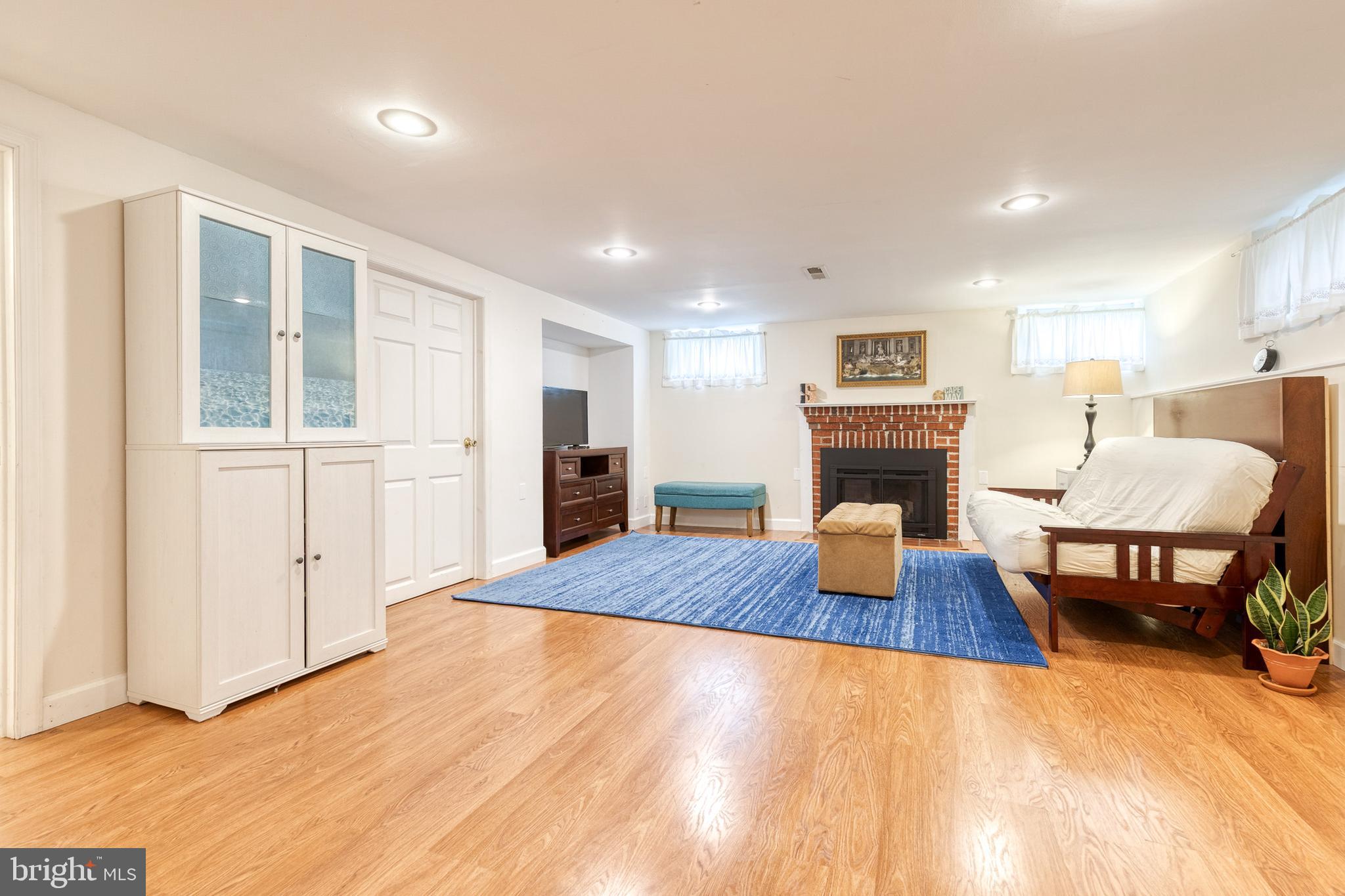8222 Pleasant Plains Road Baltimore, MD 21286 - Photo 23 of 34 Finished lower level with fireplace