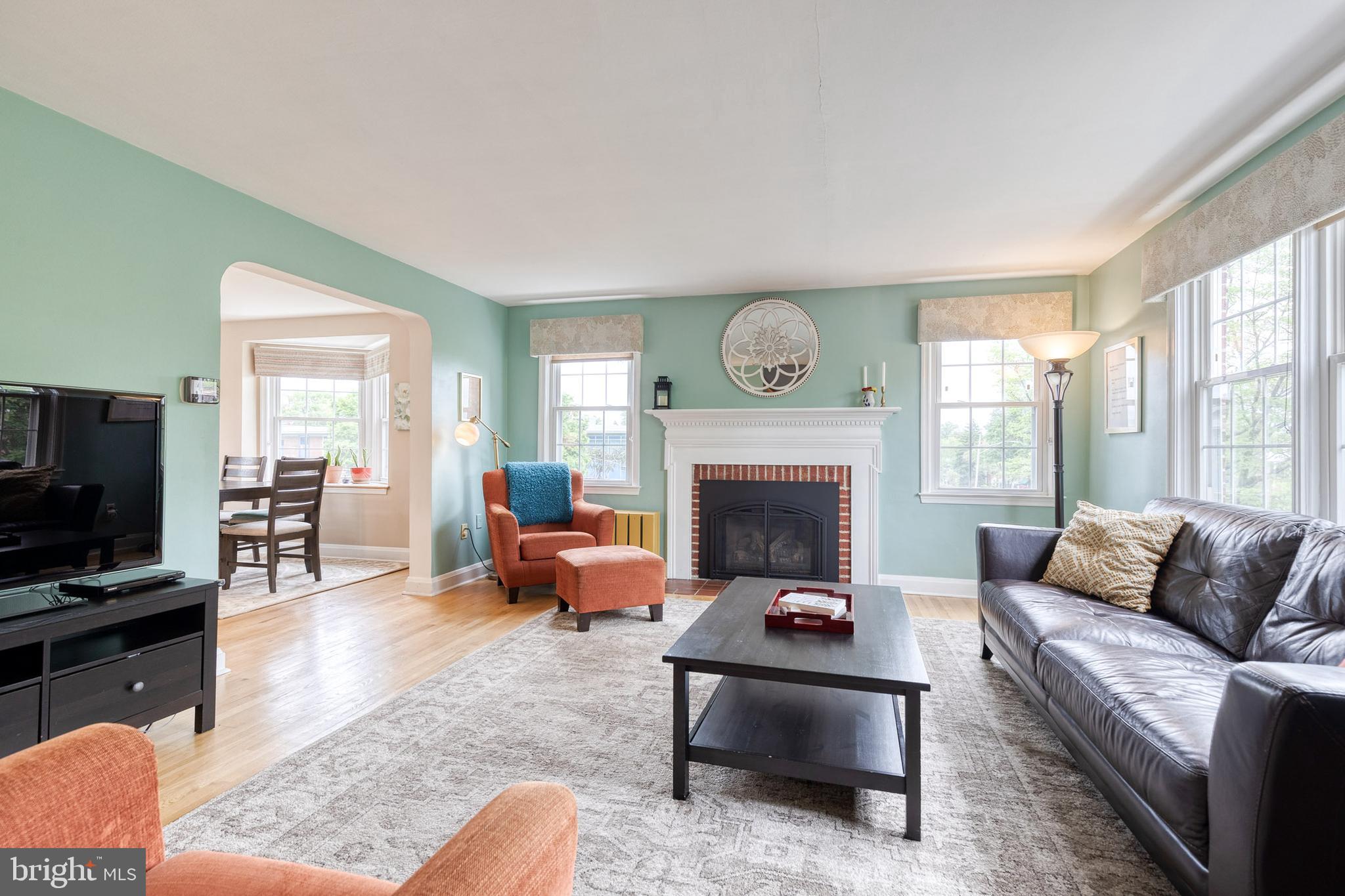 8222 Pleasant Plains Road Baltimore, MD 21286 - Photo 5 of 34 Living Room- Fireplace and natural light