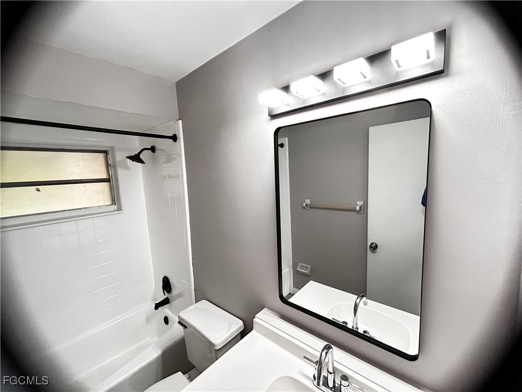 18592 Matanzas Road Fort Myers, FL 33967 - Photo 15 of 25 a bathroom with a shower and a sink