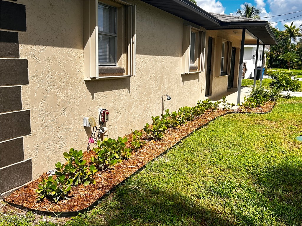 18592 Matanzas Road Fort Myers, FL 33967 - Photo 3 of 25 a bathroom with a bathtub and a sink