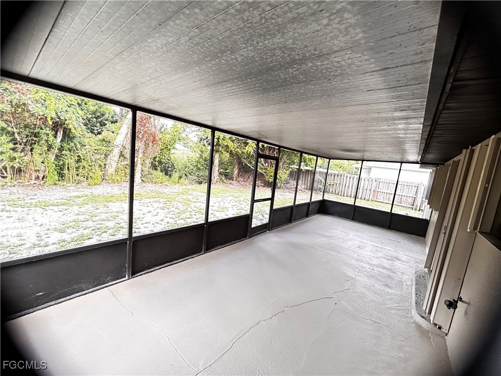 18592 Matanzas Road Fort Myers, FL 33967 - Photo 7 of 25 a view of an empty room with a large window