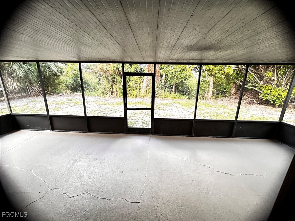 18592 Matanzas Road Fort Myers, FL 33967 - Photo 8 of 25 a view of an empty room with a large window