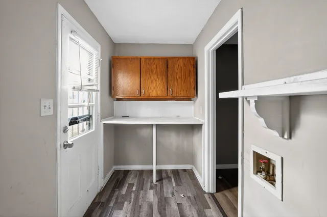 a house view with a backyard space