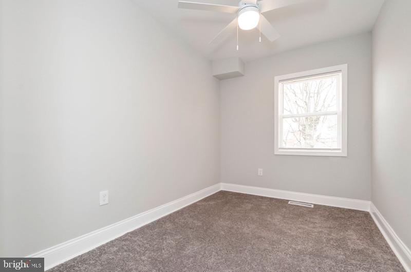 1426 East Cold Spring Lane Baltimore, MD 21239 - Photo 15 of 27 an empty room with a window