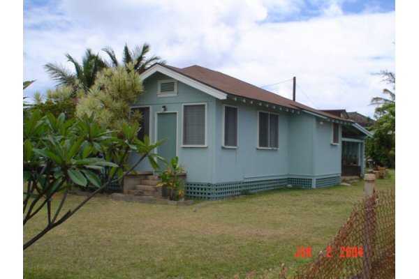 a house with trees in front of it