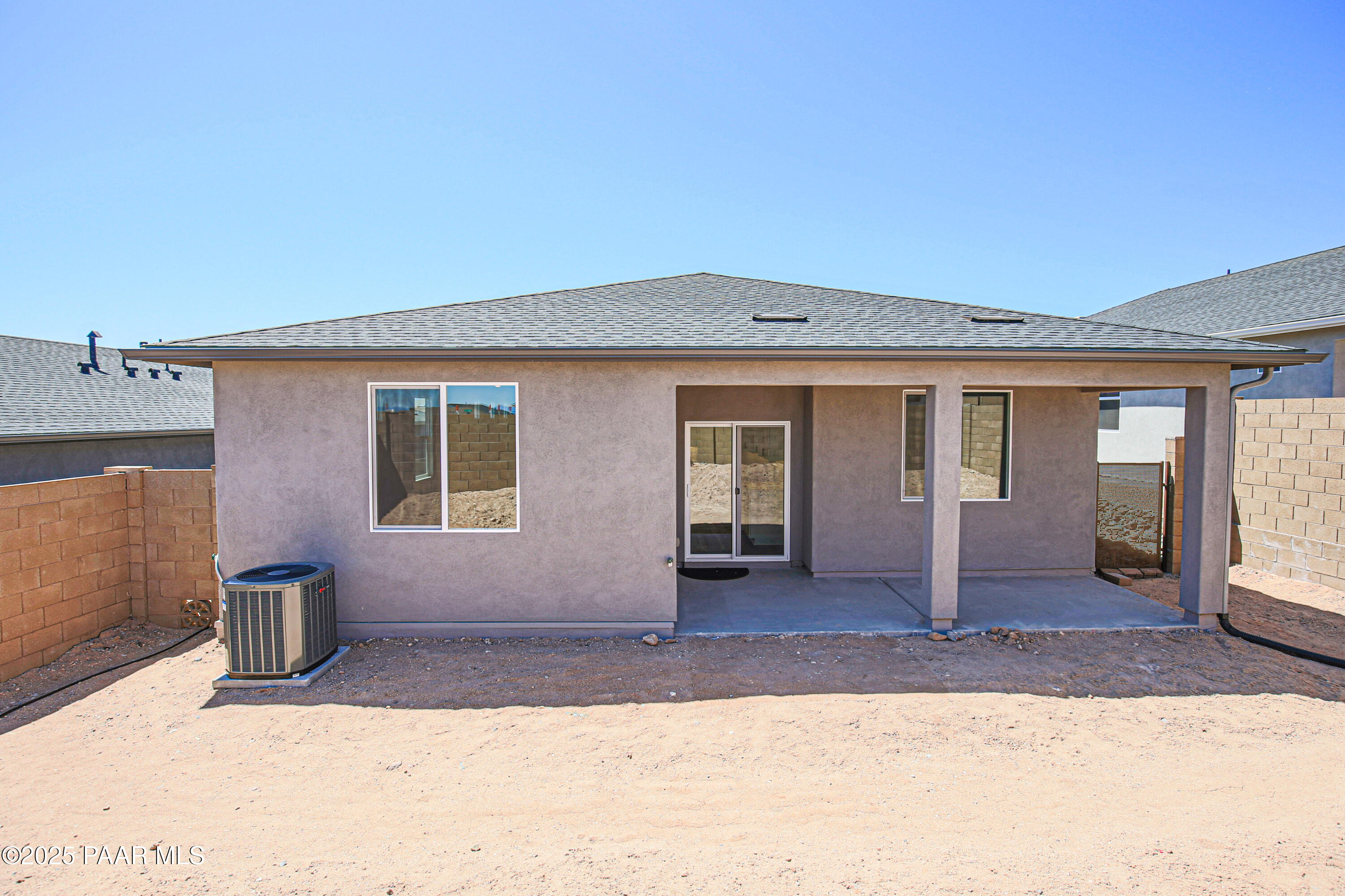 1224 Woodchute Road Prescott, AZ 86305 - Photo 37 of 43 a front view of a house with a yard and garage