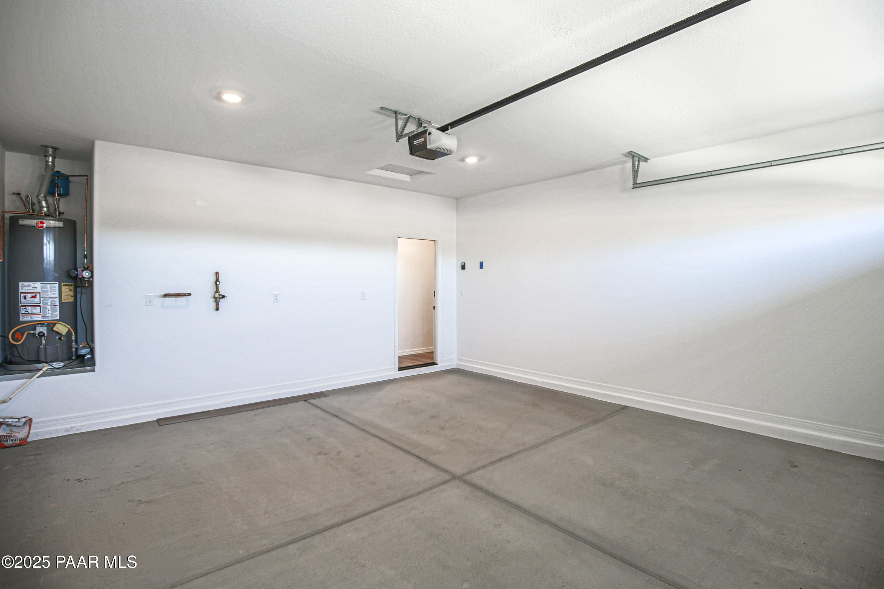 1224 Woodchute Road Prescott, AZ 86305 - Photo 42 of 43 an empty room with a ceiling fan and a window