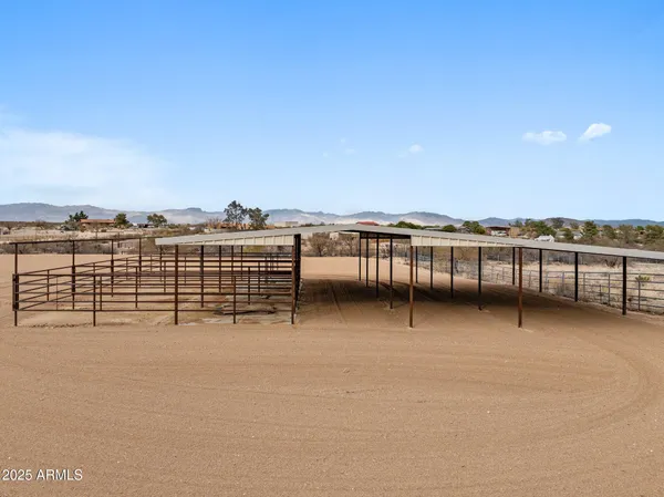 a view of a terrace with two chairs