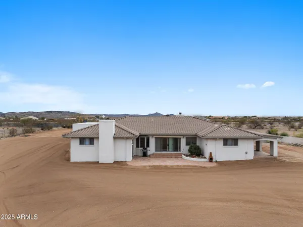 a view of a house with a ocean view