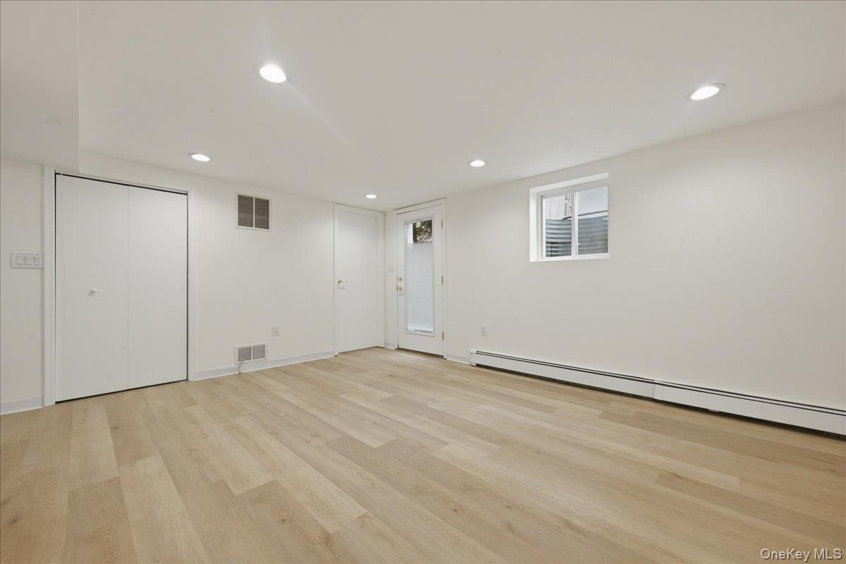 84 North Fordham Road Hicksville, NY 11801 - Photo 20 of 28 a view of an empty room