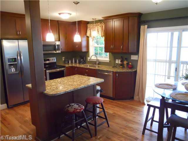 2296 Beckner Road Lexington, NC 27292 - Photo 4 of 16 Kitchen. Wood Gilchrest Cabinets with Many Extra Features As Well As Granite COunters And Island!