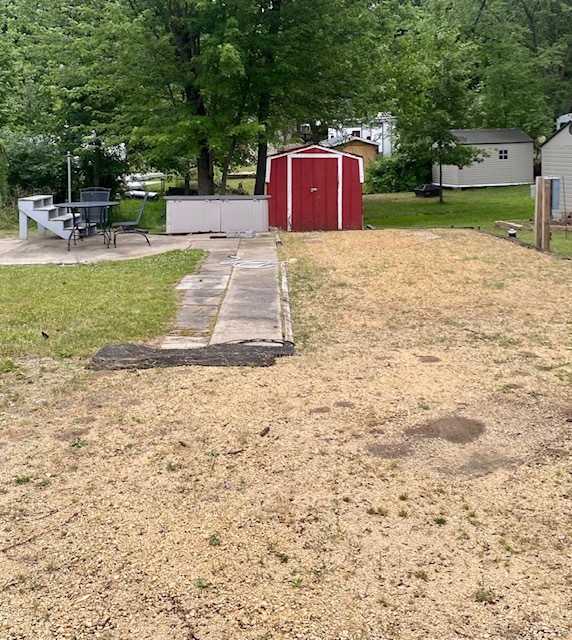 a house with trees in the background