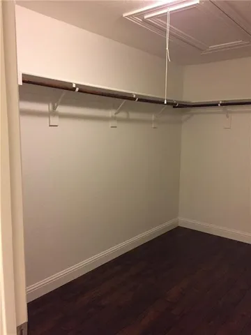 a view of a room with racks on the wall