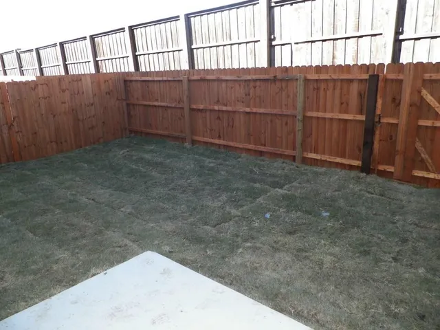 a view of wooden fence