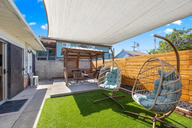 a view of yard with patio