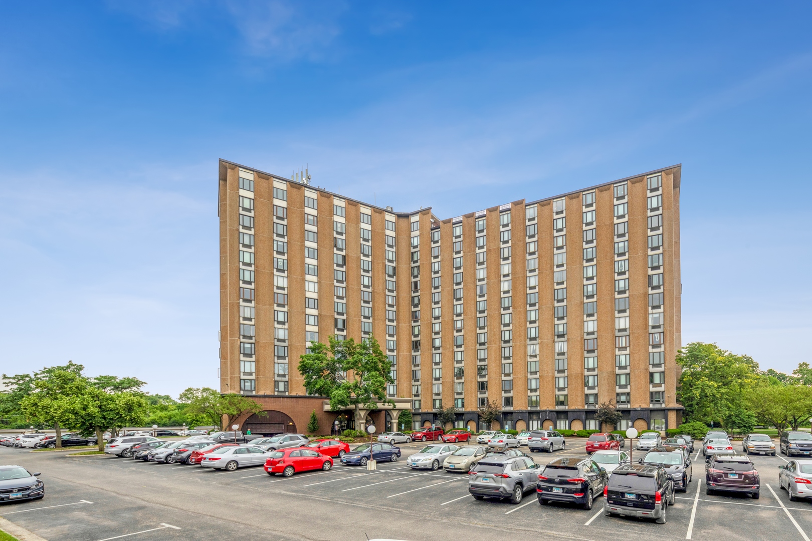 1 Renaissance Place, Unit 1216 Palatine, IL 60067 - Photo 1 of 16 a cars parked in front of a building
