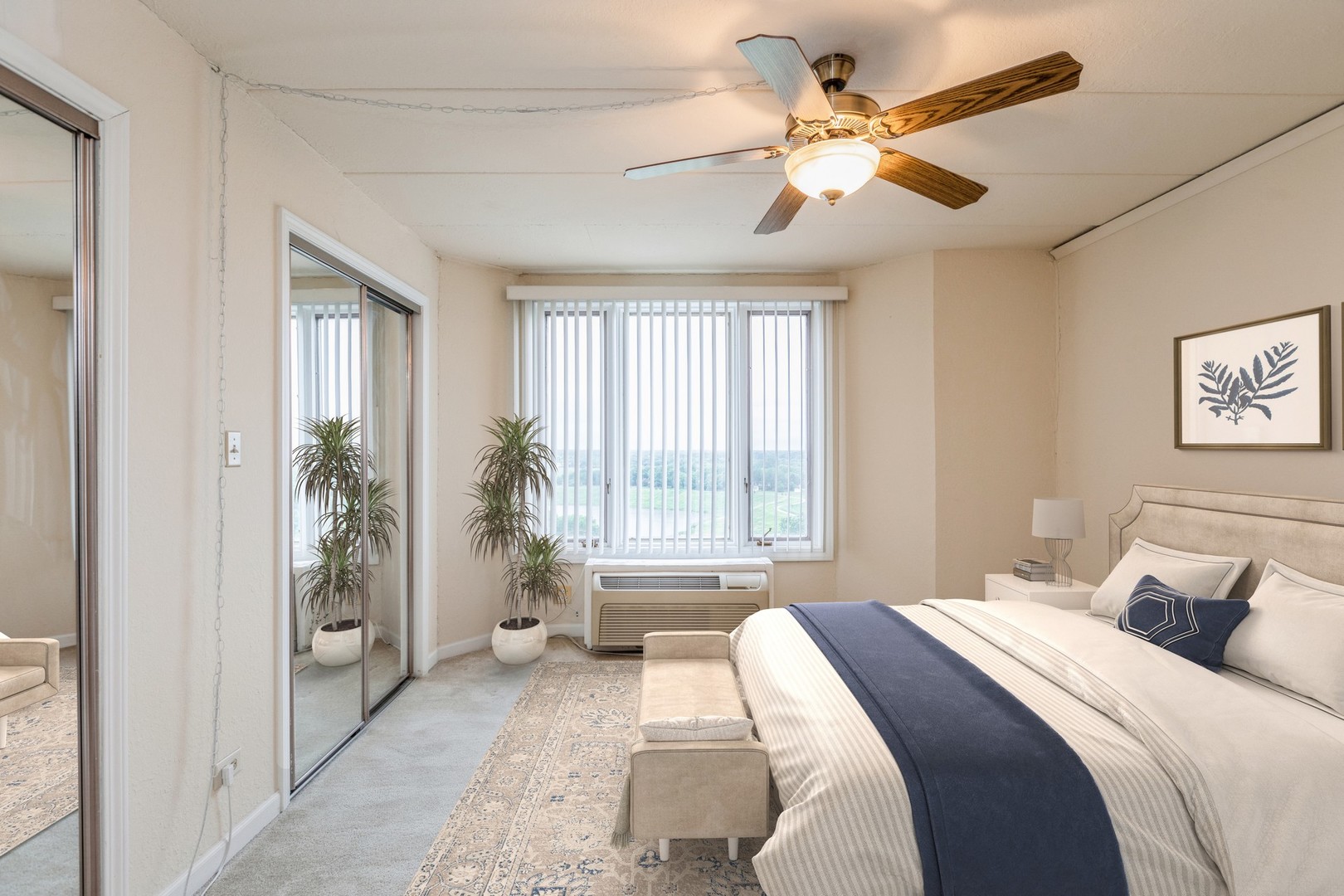 1 Renaissance Place, Unit 1216 Palatine, IL 60067 - Photo 11 of 16 a bedroom with a large bed and a chandelier fan