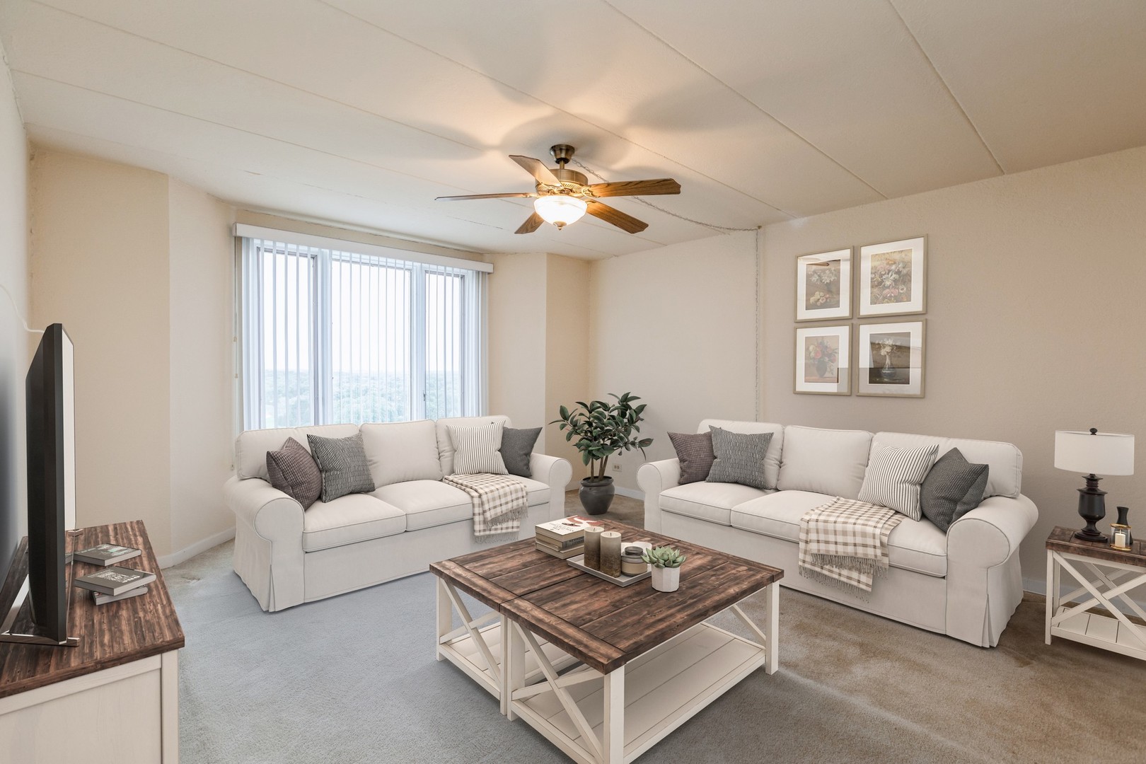 1 Renaissance Place, Unit 1216 Palatine, IL 60067 - Photo 5 of 16 a living room with furniture a large window and a flat screen tv