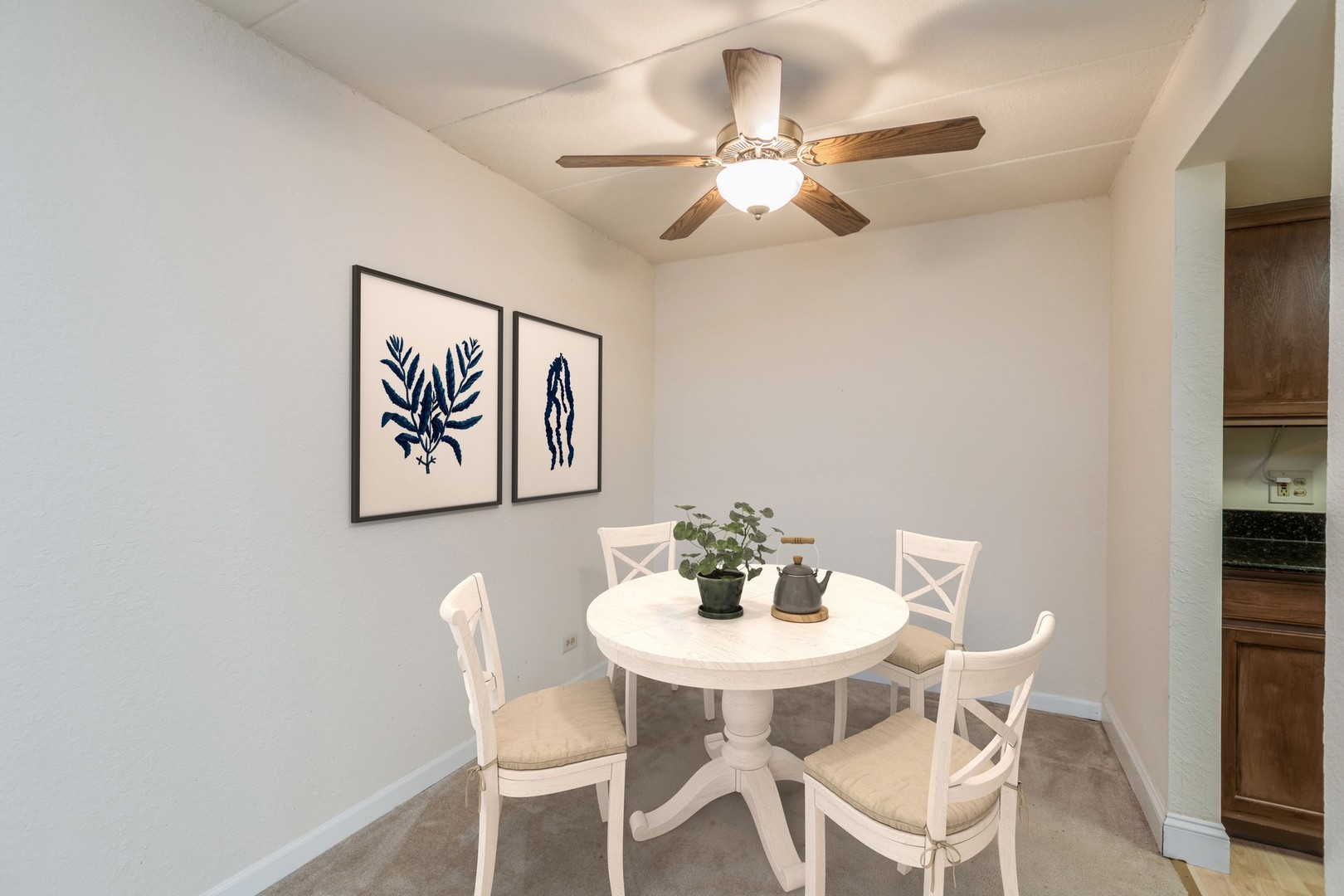 1 Renaissance Place, Unit 1216 Palatine, IL 60067 - Photo 7 of 16 a view of a dining room with furniture and chandelier