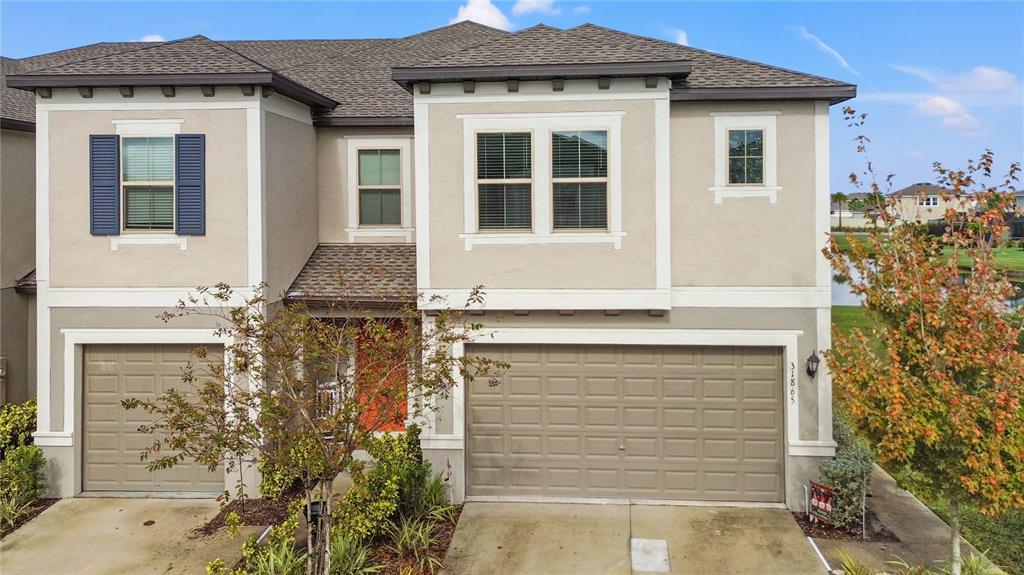 31865 Blue Passing Loop Wesley Chapel, FL 33545 - Photo 1 of 1 front view of a house