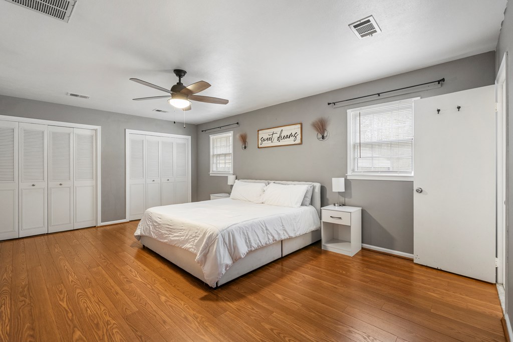 7310 Macon Road Columbus, GA 31907 - Photo 17 of 28 a bedroom with a bed and a window