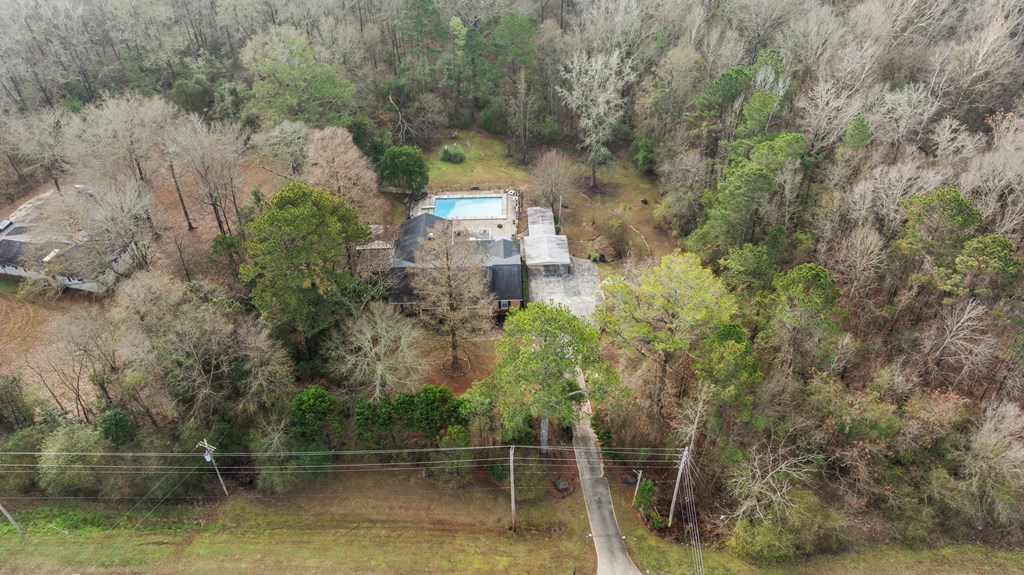 7310 Macon Road Columbus, GA 31907 - Photo 2 of 28 a view of a lake with a building in the background