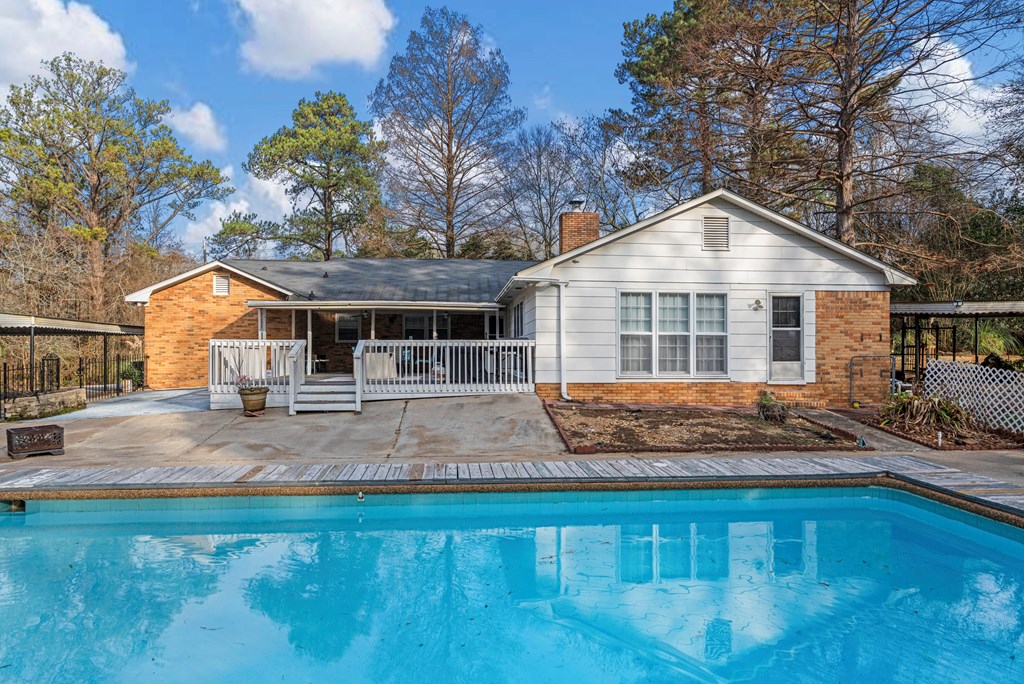 7310 Macon Road Columbus, GA 31907 - Photo 6 of 28 a front view of a house with a yard