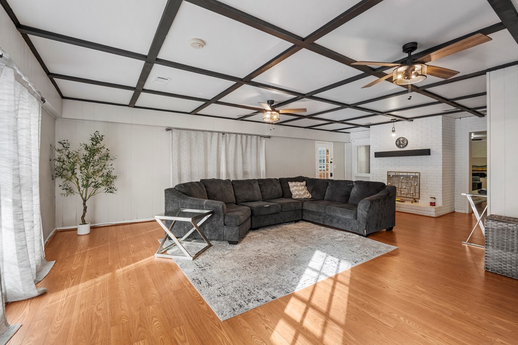 7310 Macon Road Columbus, GA 31907 - Photo 8 of 28 a living room with furniture and a flat screen tv