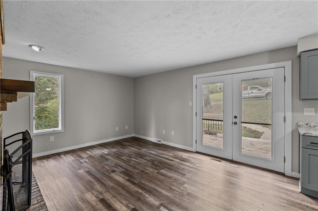 7440 Noblestown Road McDonald, PA 15057 - Photo 13 of 38 wooden floor in an empty room with a window