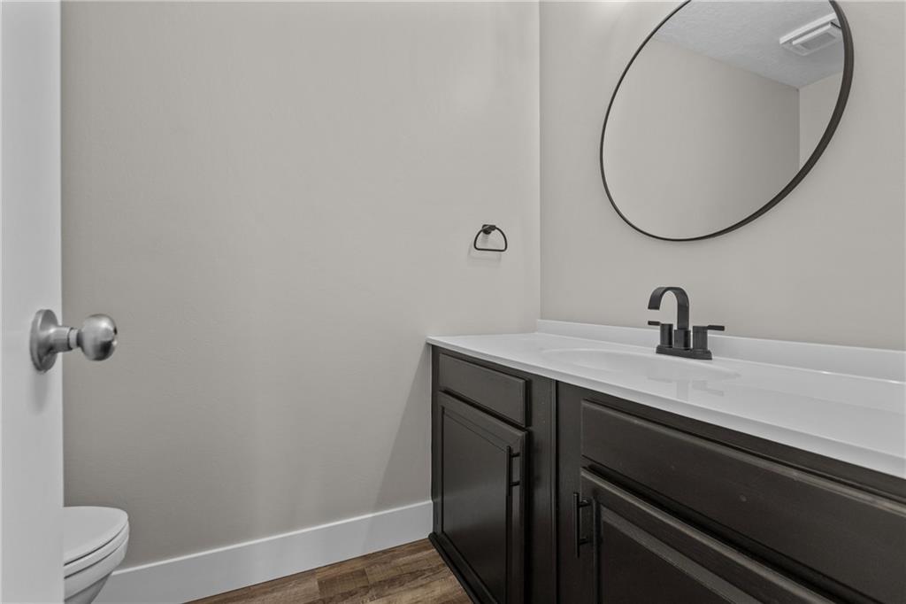 7440 Noblestown Road McDonald, PA 15057 - Photo 14 of 38 a bathroom with a sink and a mirror