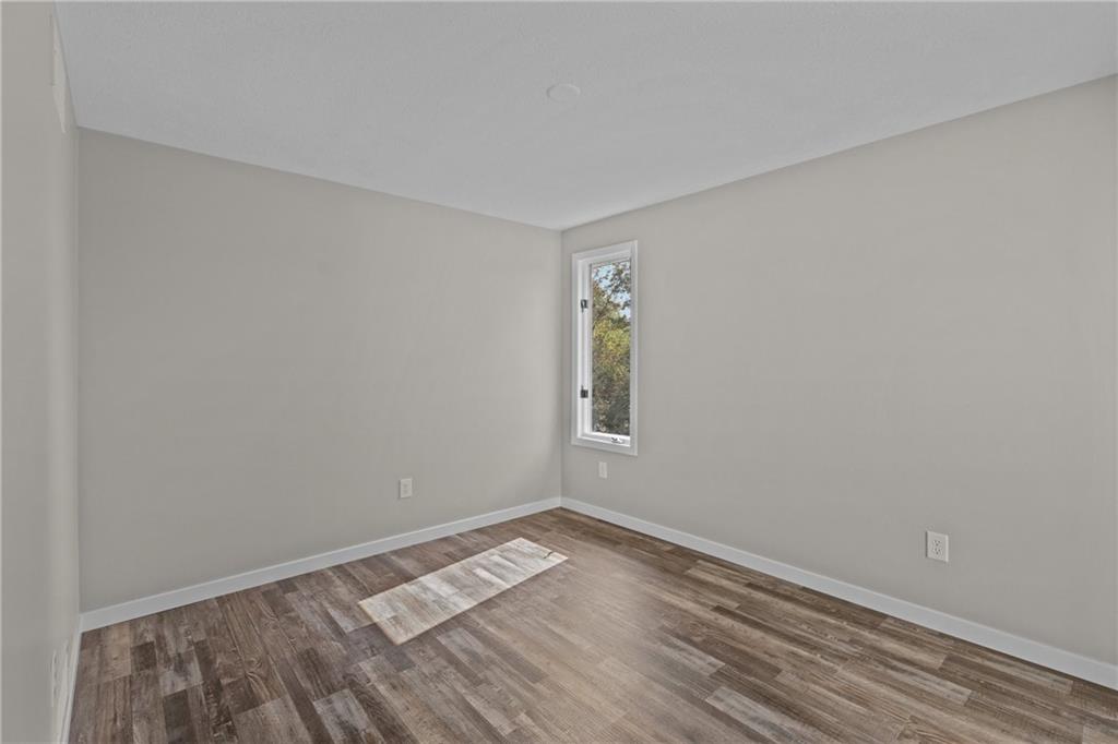 7440 Noblestown Road McDonald, PA 15057 - Photo 15 of 38 a view of a room with wooden floor and natural light