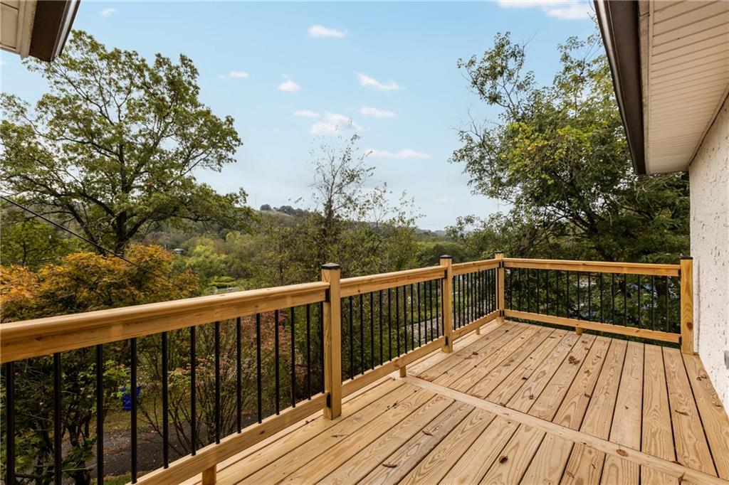 7440 Noblestown Road McDonald, PA 15057 - Photo 17 of 38 a view of balcony and wooden floor