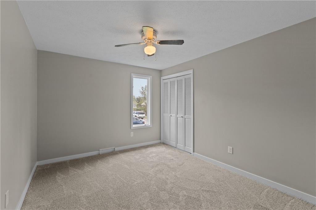 7440 Noblestown Road McDonald, PA 15057 - Photo 27 of 38 an empty room with windows and fan