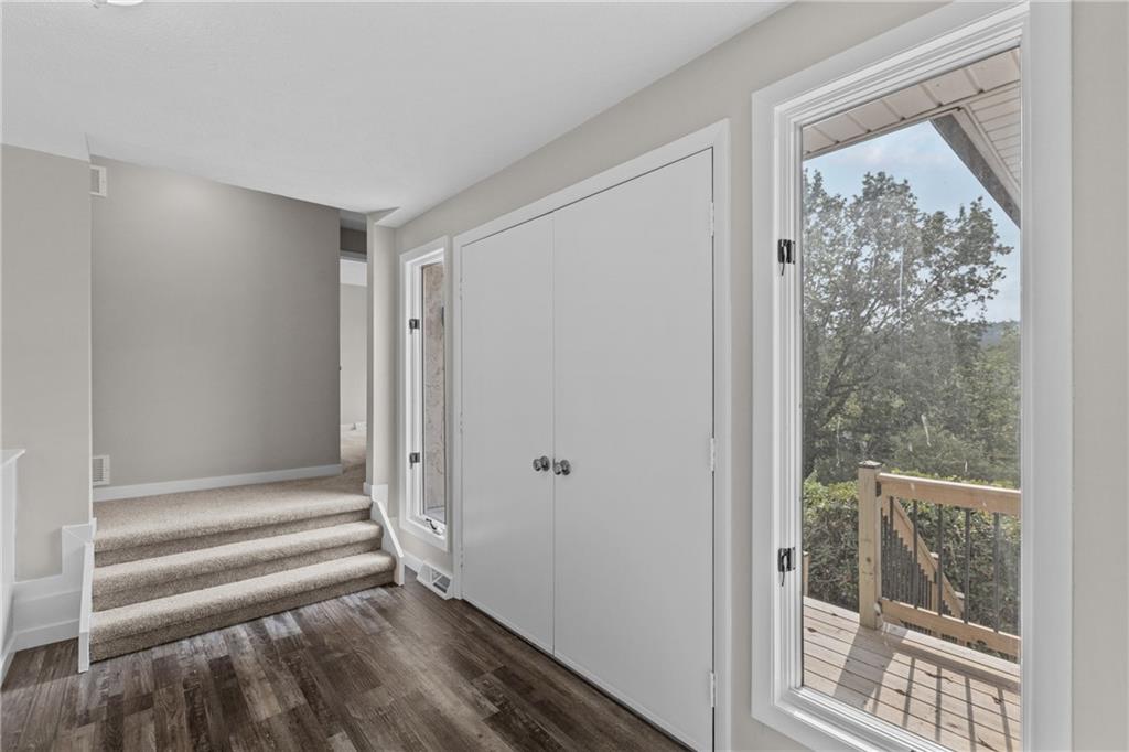 7440 Noblestown Road McDonald, PA 15057 - Photo 3 of 38 a view of a livingroom with wooden floor and a window