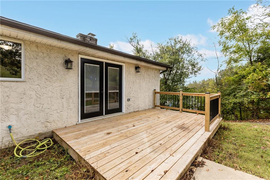 7440 Noblestown Road McDonald, PA 15057 - Photo 34 of 38 a spacious bedroom with a bed and a potted plant