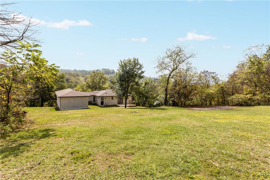 7440 Noblestown Road McDonald, PA 15057 - Photo 37 of 38 a house with trees in front of it