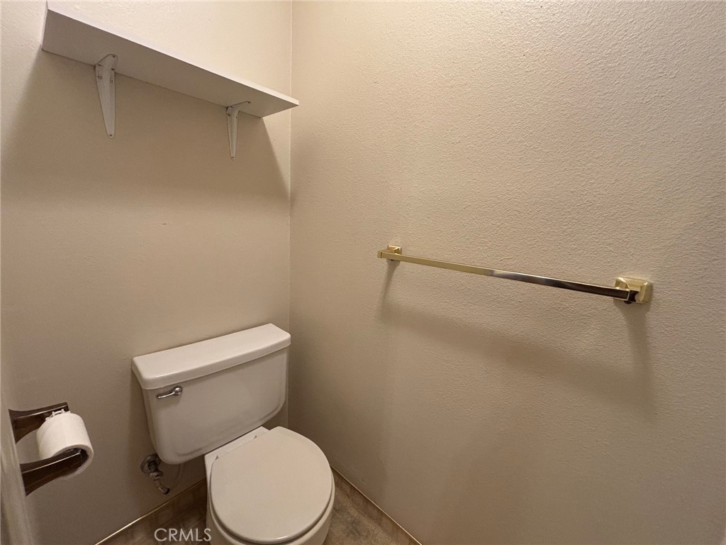 4918 Indian Peak Road Mariposa, CA 95338 - Photo 26 of 39 a white toilet sitting next to a shower