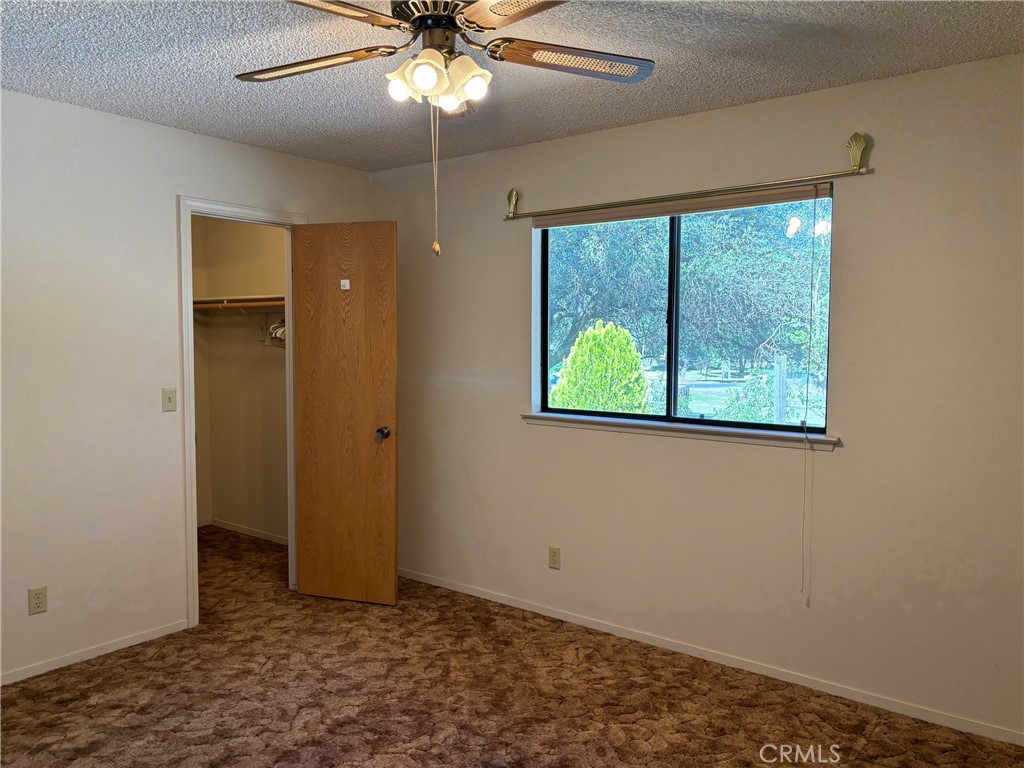 4918 Indian Peak Road Mariposa, CA 95338 - Photo 30 of 39 a view of an empty room with a window