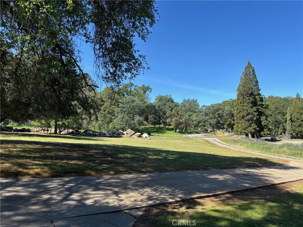 4918 Indian Peak Road Mariposa, CA 95338 - Photo 33 of 39 a view of a golf course with a lake