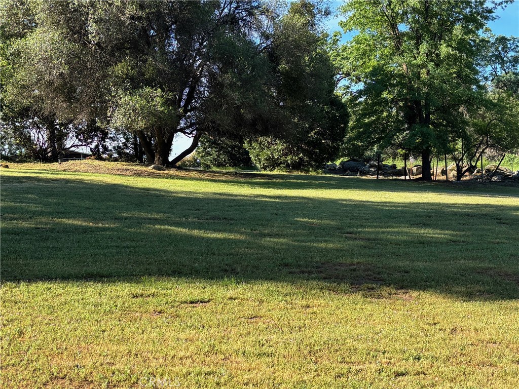 4918 Indian Peak Road Mariposa, CA 95338 - Photo 39 of 39 a swimming pool with wooden fence
