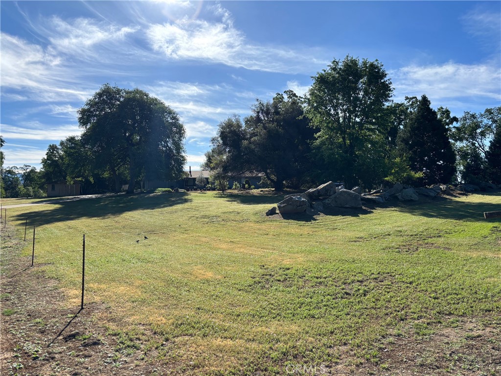 4918 Indian Peak Road Mariposa, CA 95338 - Photo 6 of 39 a view of a swimming pool with an outdoor seating