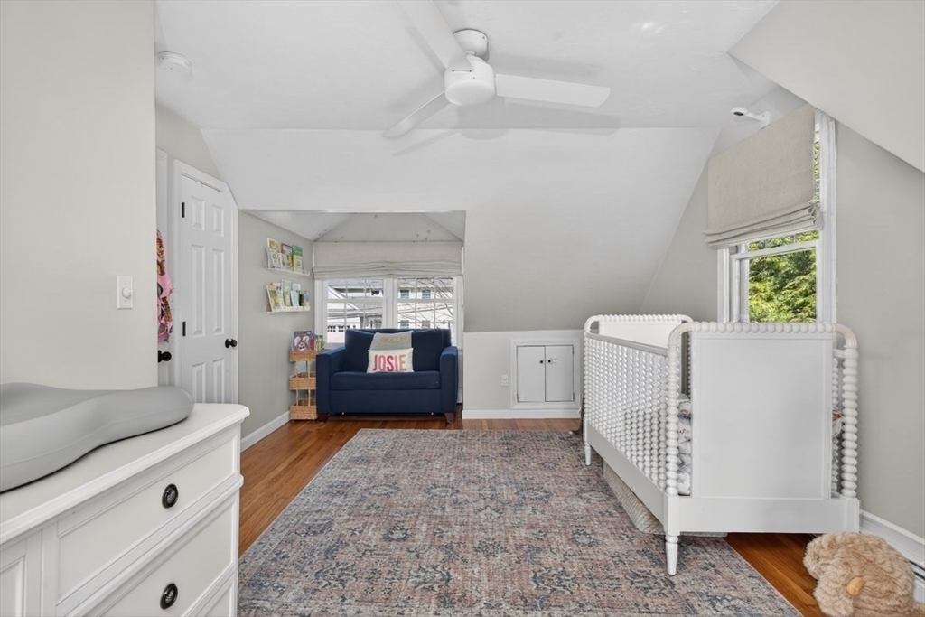 12 Tupelo Road Cohasset, MA 02025 - Photo 26 of 35 a living room with furniture a fireplace and a open kitchen view
