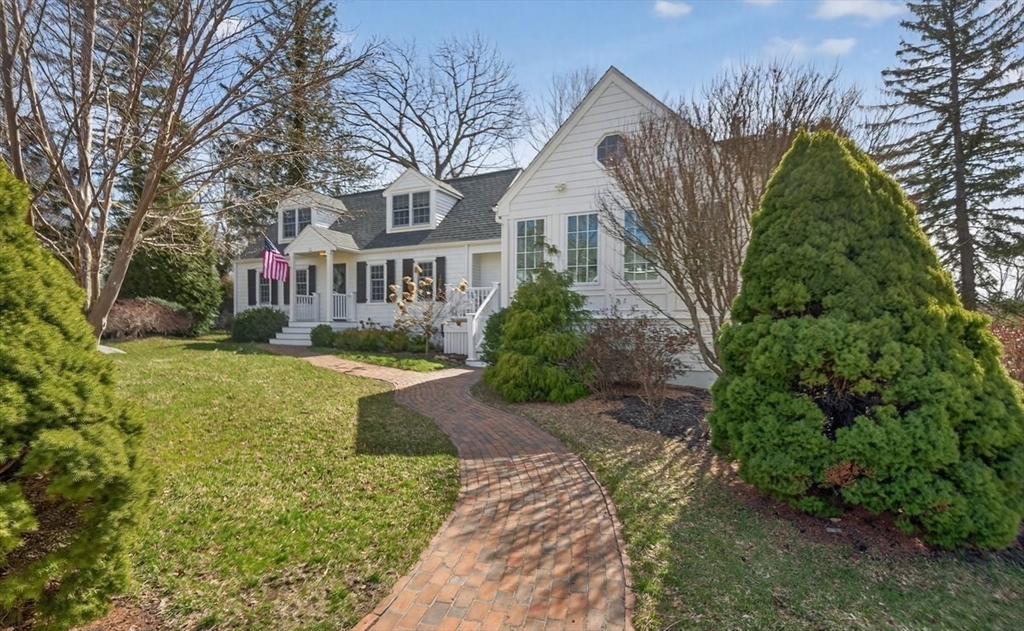 12 Tupelo Road Cohasset, MA 02025 - Photo 4 of 35 a front view of a house with garden