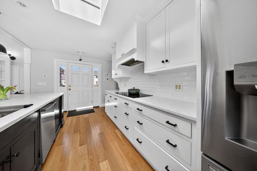 12 Tupelo Road Cohasset, MA 02025 - Photo 8 of 35 a kitchen with stainless steel appliances a stove refrigerator sink and cabinets